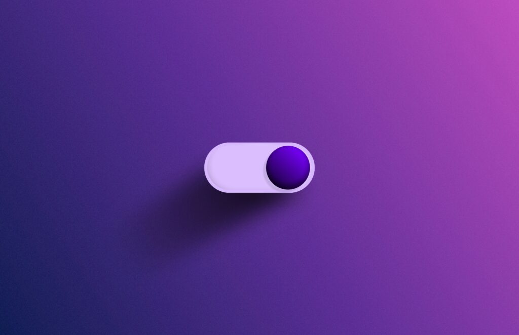 Toggle viola acceso su sfondo chiaro come esempio di interfaccia utente reattiva